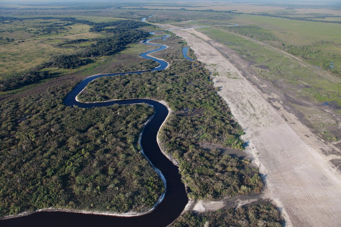 The Kissimmee River Restoration project is a congressionally authorized undertaking sponsored by the U. S. Army Corps of Engineers and the South Florida Water Management District, the non-federal sponsor. The project encompasses the removal of two water control structures, filling approximately 22 miles of canal, and restoring over 40 square miles of the river channel and floodplain ecosystem, including approximately 27,000 acres of wetlands. 