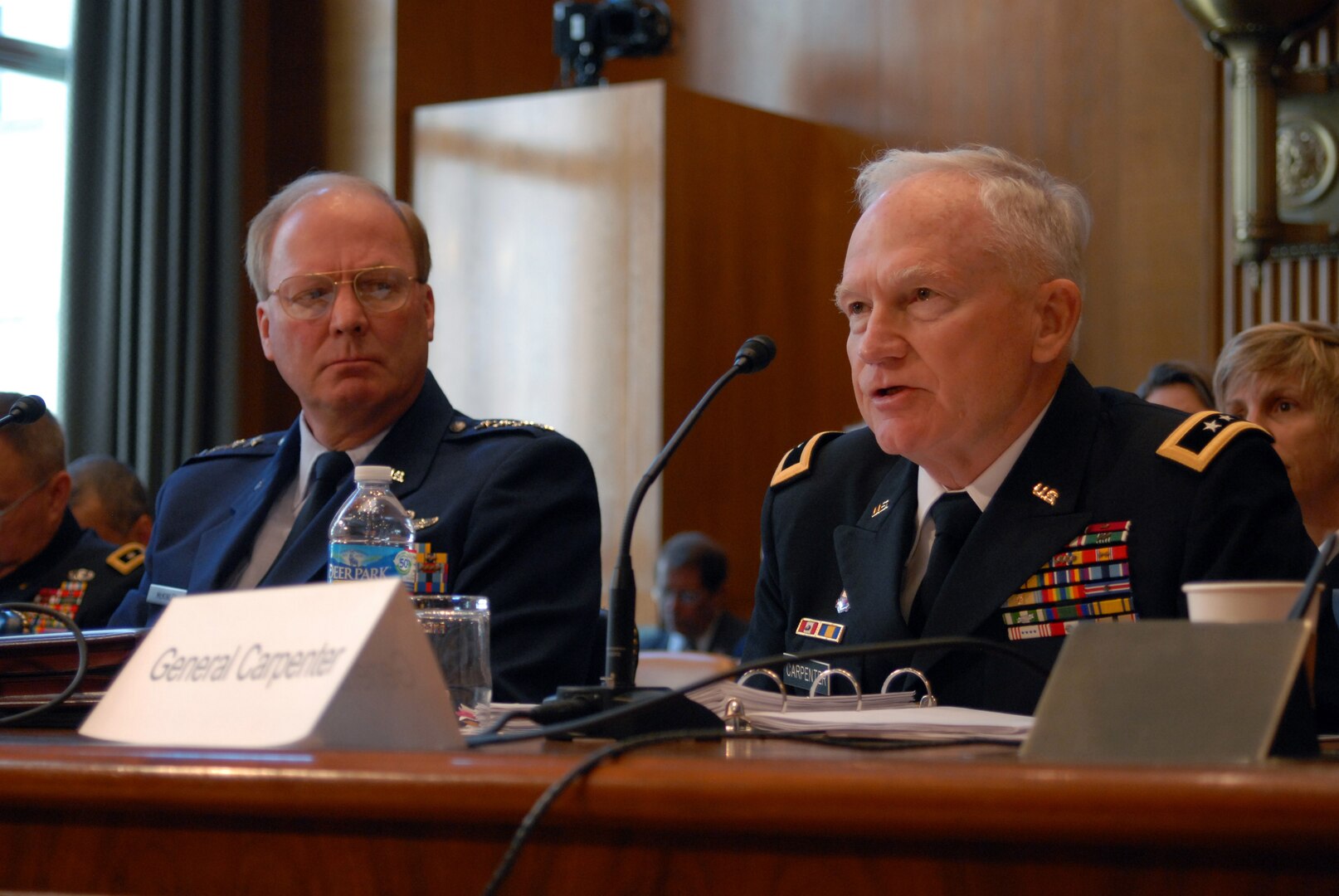 Army Maj. Gen. Raymond Carpenter, acting director of the Army National Guard, talks about the Army Guard as an operational force during a Senate Appropriations Committee hearing in Washington, May 11, 2011. Air Force Gen. Craig McKinley (left), chief of the National Guard Bureau, and Air Force Lt. Gen. Harry "Bud" Wyatt, director of the Air National Guard, also talked about how far the Air Guard and the National Guard as a whole have come since 9/11.
