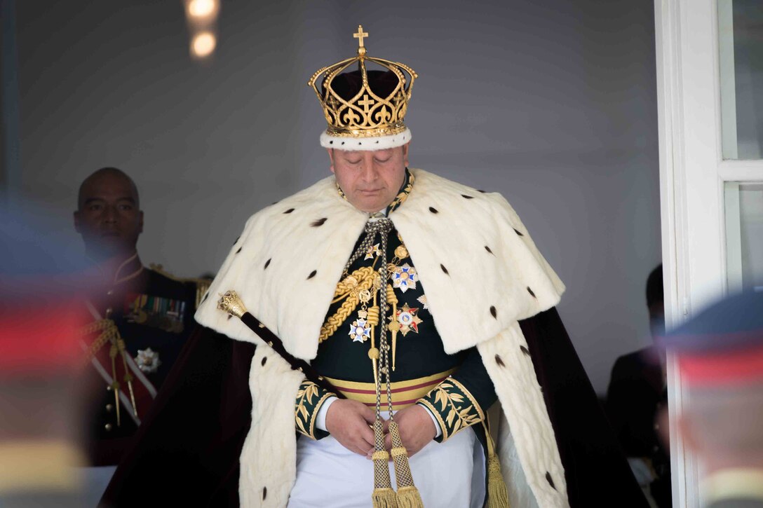 King Tupou VI exits the church after his coronation ceremony in Nuku'alofa, Tonga, July 4, 2015. The U.S. Marine Corps Forces, Pacific Band participated in the coronation ceremonies alongside bands from Tonga, Australia and New Zealand.