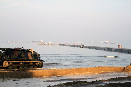 ANMYEON BEACH, South Korea (July 6, 2015) - An M88 armored recovery vehicle is securing the Trident Pier during combined Joint Logistics Over-the-Shore (CJLOTS) 2015. CJLOTS 2015 is an exercise designed to train U.S. and ROK services members to accomplish vital logistical measures in a strategic area while strengthening communication and cooperation in the U.S.-ROK Alliance. 