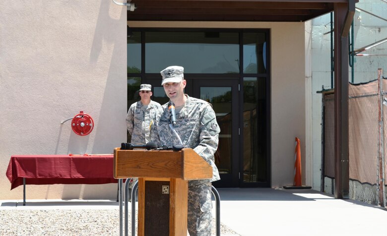 KIRTLAND AIR FORCE BASE, N.M. – District Commander Lt. Col. Patrick Dagon speaks at the ribbon-cutting ceremony to officially open Phase 1 of the Air Force Nuclear Weapons Center expansion, June 29, 2015.  
