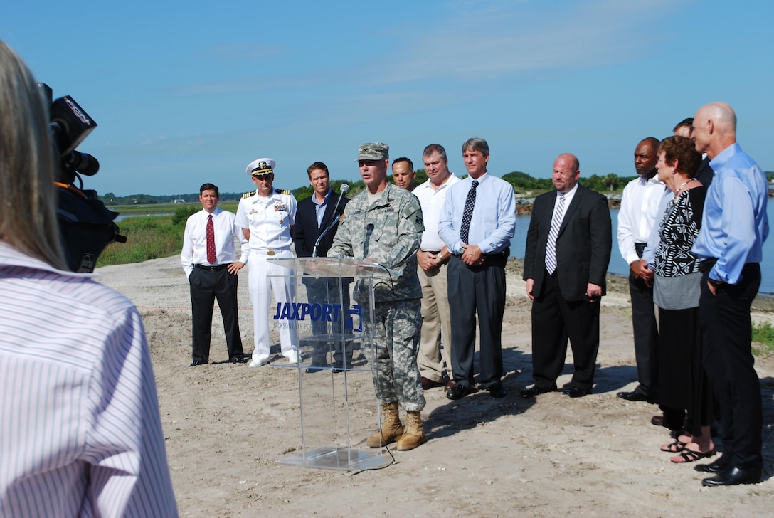 Col. Alan Dodd, commander of Jacksonville District, U.S. Army Corps of Engineers, speaks to a large audience at Helen Cooper Floyd Park during a Mile Point project groundbreaking ceremony. Florida Governor Rick Scott, Florida Department of Transportation  Secretary Jim Boxold, Jacksonville Mayor Lenny Curry, JaxPort officials and many other dignitaries attended the ceremony July 7.    