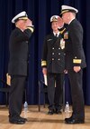141024-N-OR058-075 WEST BETHESDA, Md. (Oct. 24, 2014) Rear Adm. Lorin Selby salutes Rear Adm. Lawrence Creevy during a change of command ceremony at Naval Surface Warfare Center Carderock Division as Vice Adm. William Hilarides, commander of Naval Sea Systems Command looks on. Selby relieved Creevy as commanding officer of the command. (U.S. Navy photo by Ryan Hanyok/Released) 