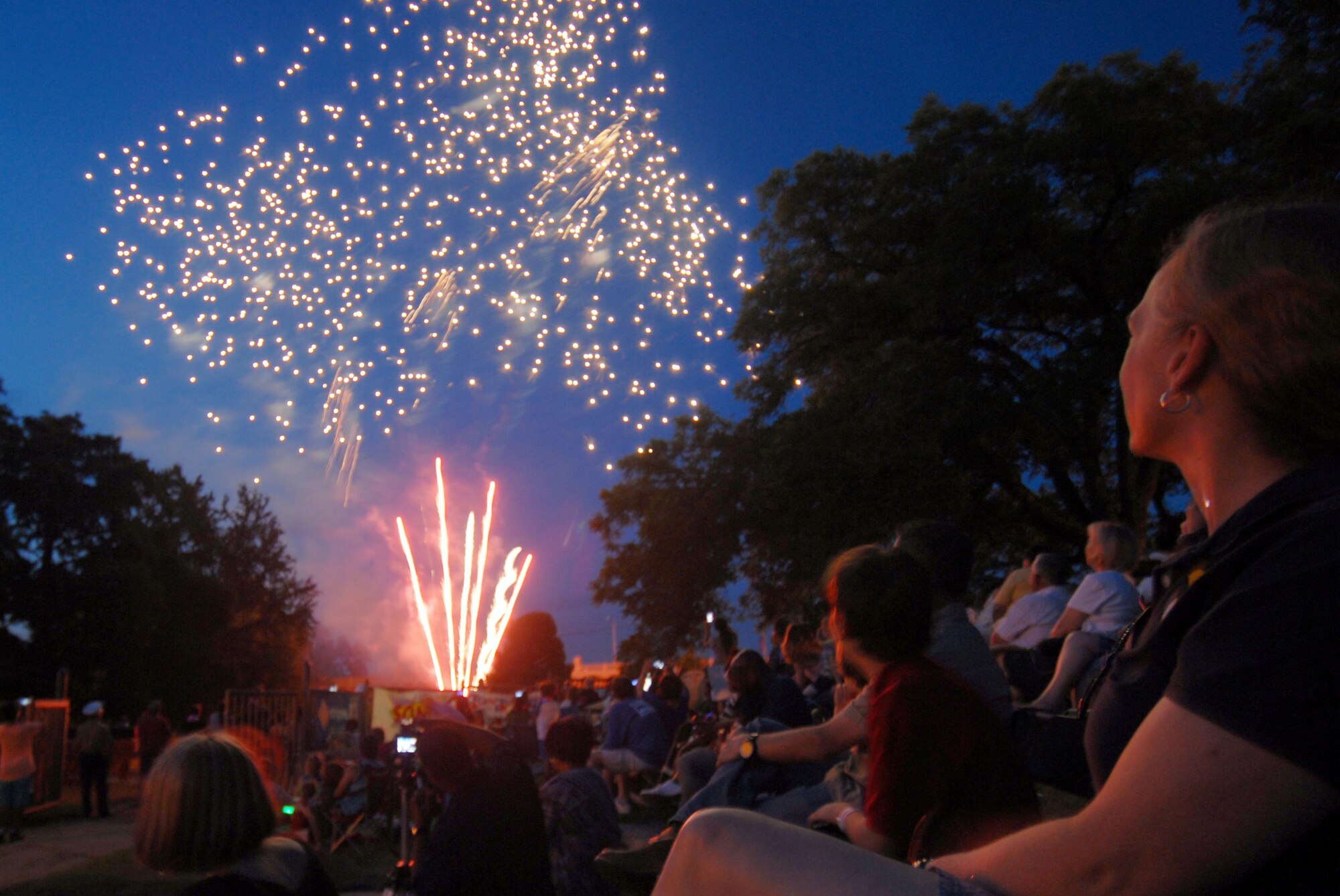 U.S. Air Force Col. Kimberlee P. Joos, 17th Training Wing Commander, watches fireworks during the San Angelo Symphony’s Pops Concert at the Bill Aylor Sr. Memorial RiverStage in San Angelo, Texas, July 3, 2015. This concert drew in over 35,000 people and is now the fourth-largest in the state. (U.S. Air Force photo by Senior Airman Joshua Edwards/Released)