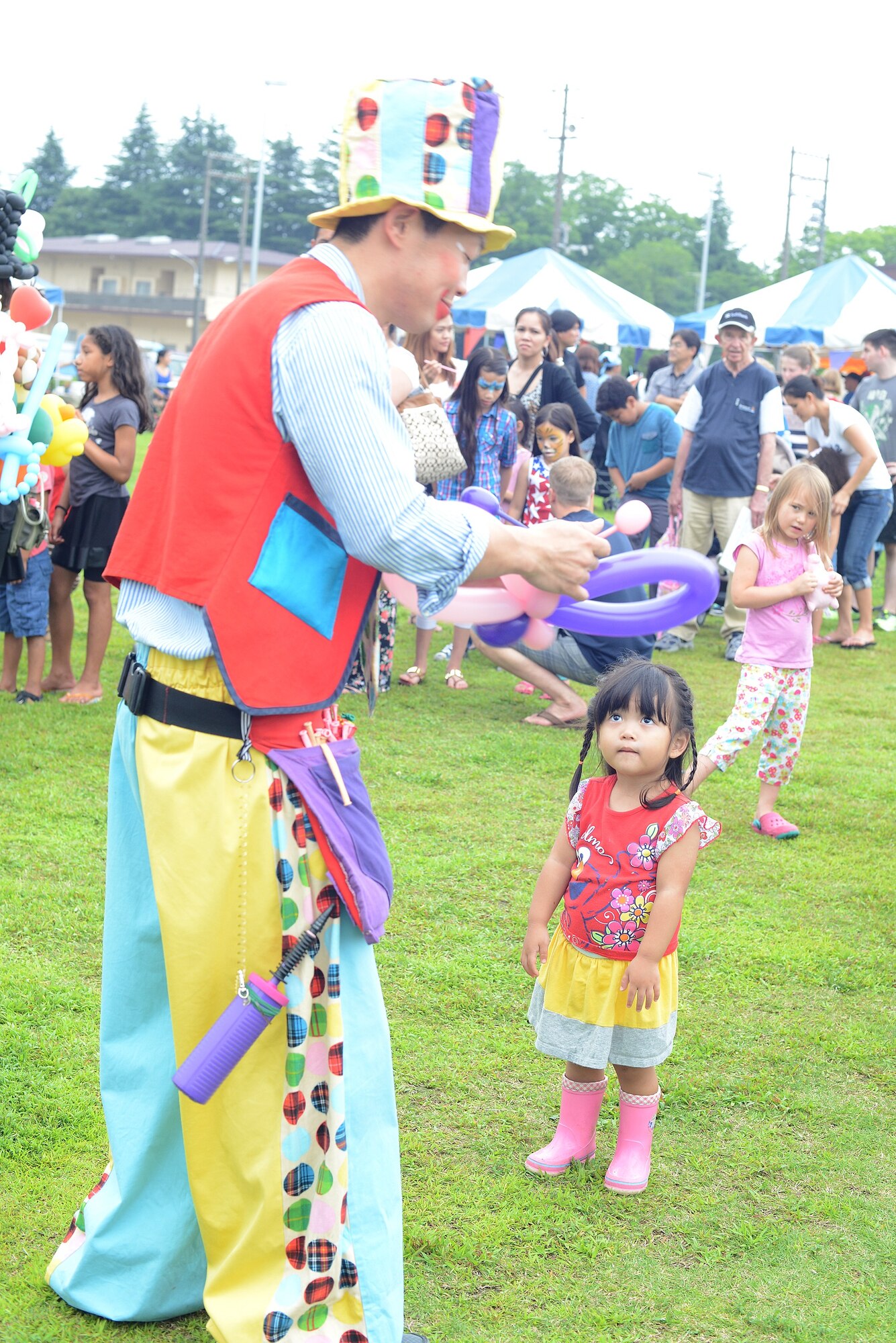 Travis Weaver shows national pride during Celebrate America at Yokota Air Base, Japan, July 2, 2015. The annual event provided military members and their families the opportunity to enjoy games, food and music culminating in a fireworks display over the Yokota airfield to celebrate Independence Day. (U.S. Air Force photo by Airman 1st Class David C. Danford/Released)
