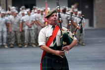 A bagpiper plays prior to the 1st Light Armored Reconnaissance Battalion 30th anniversary rededication ceremony aboard Marine Corps Base Camp Pendleton, Calif., July 1, 2015. After the ceremony, the Marines and Sailors of the battalion, part of the 1st Marine Division, hiked to a nearby beach and held the annual Highlander Games Warrior Night. (U.S. Marine Corps photo by Staff Sgt. Bobbie A. Curtis)