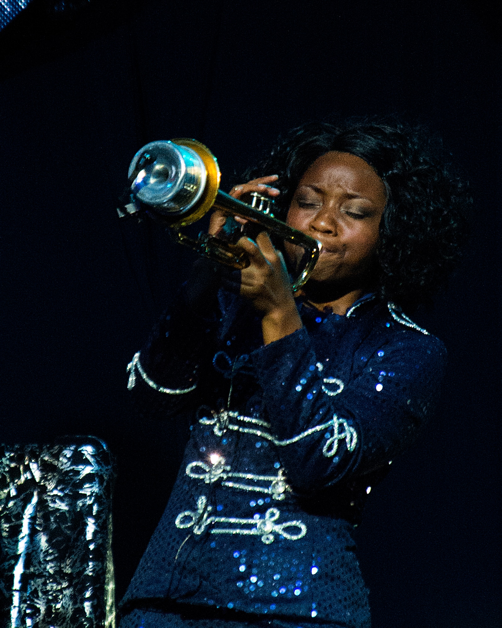 Staff Sgt. Jessica Pitts performs a solo during the Tops in Blues’ Independence Day show in the Cheyenne Frontier Days Arena, Cheyenne, Wyo., July 4, 2015. The 90-minute, high-energy show entertained an audience of several thousand prior to Cheyenne’s fireworks show. (U.S. Air Force photo by R.J. Oriez/Released) 