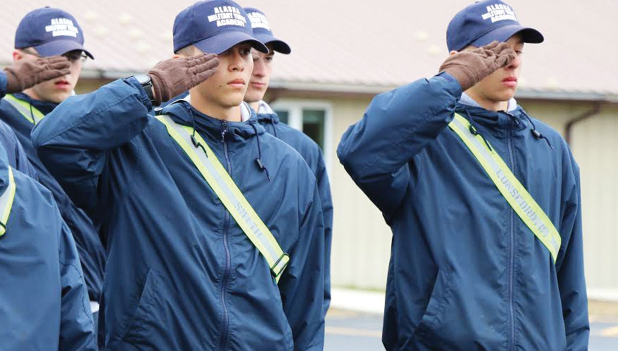 Alaska Military Youth Academy cadets salute during a uniform inspection. The AMYA Challenge program is a 17.5 month, quasi-military residential and non-residential high school which uses military values and methodology to reclaim the lives of Alaska’s at-risk youth. (Courtesy photo/Roman Schara)