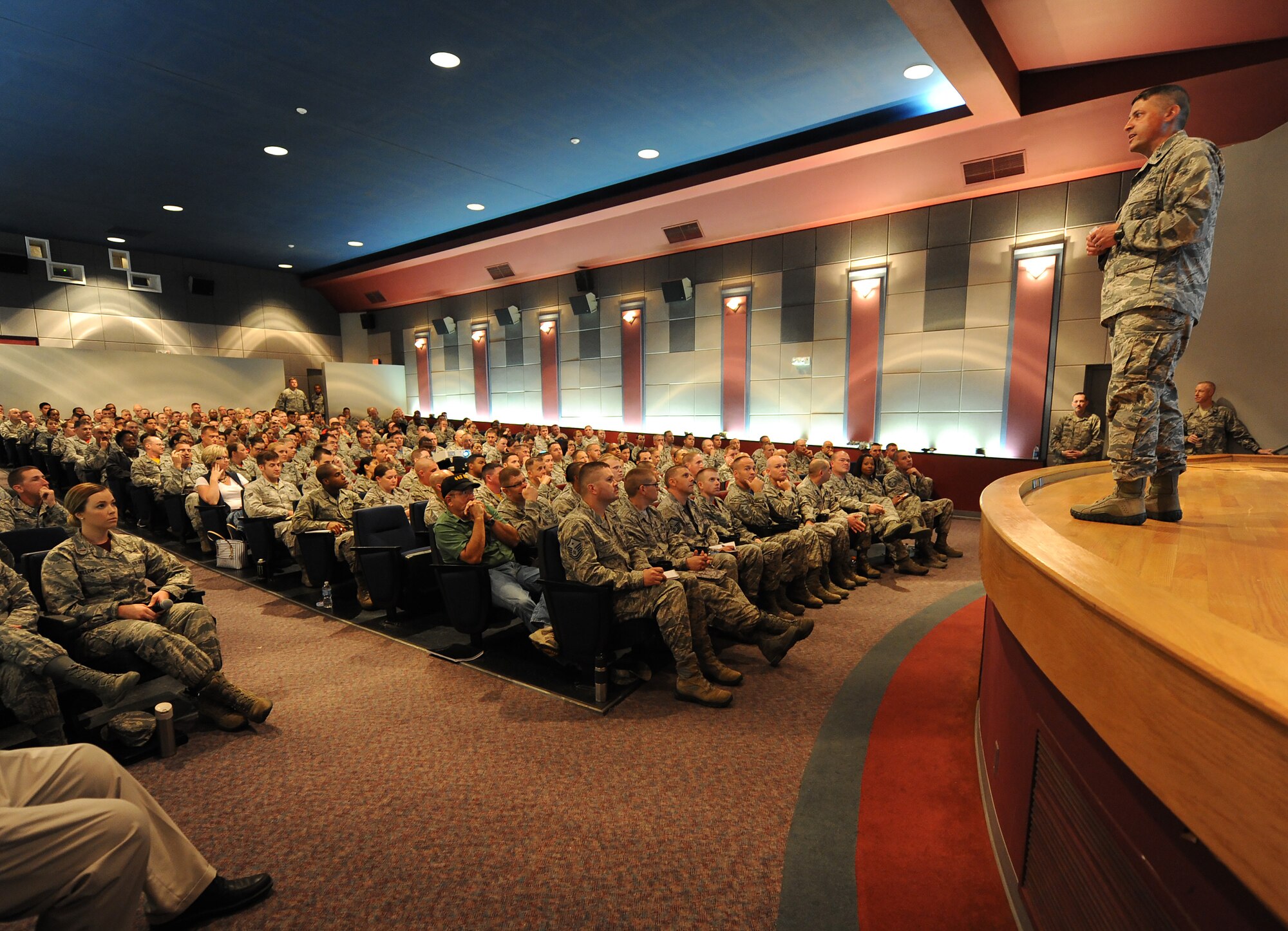 Airmen attend a briefing at Whiteman Air Force Base, Mo., June 26, 2015, about the new changes in the Enlisted Evaluation System and Weighted Airman Promotion System. The briefing is also scheduled for other bases to inform Airmen of upcoming changes. (U.S. Air Force photo by Airman 1st Class Michaela R. Slanchik/Released)