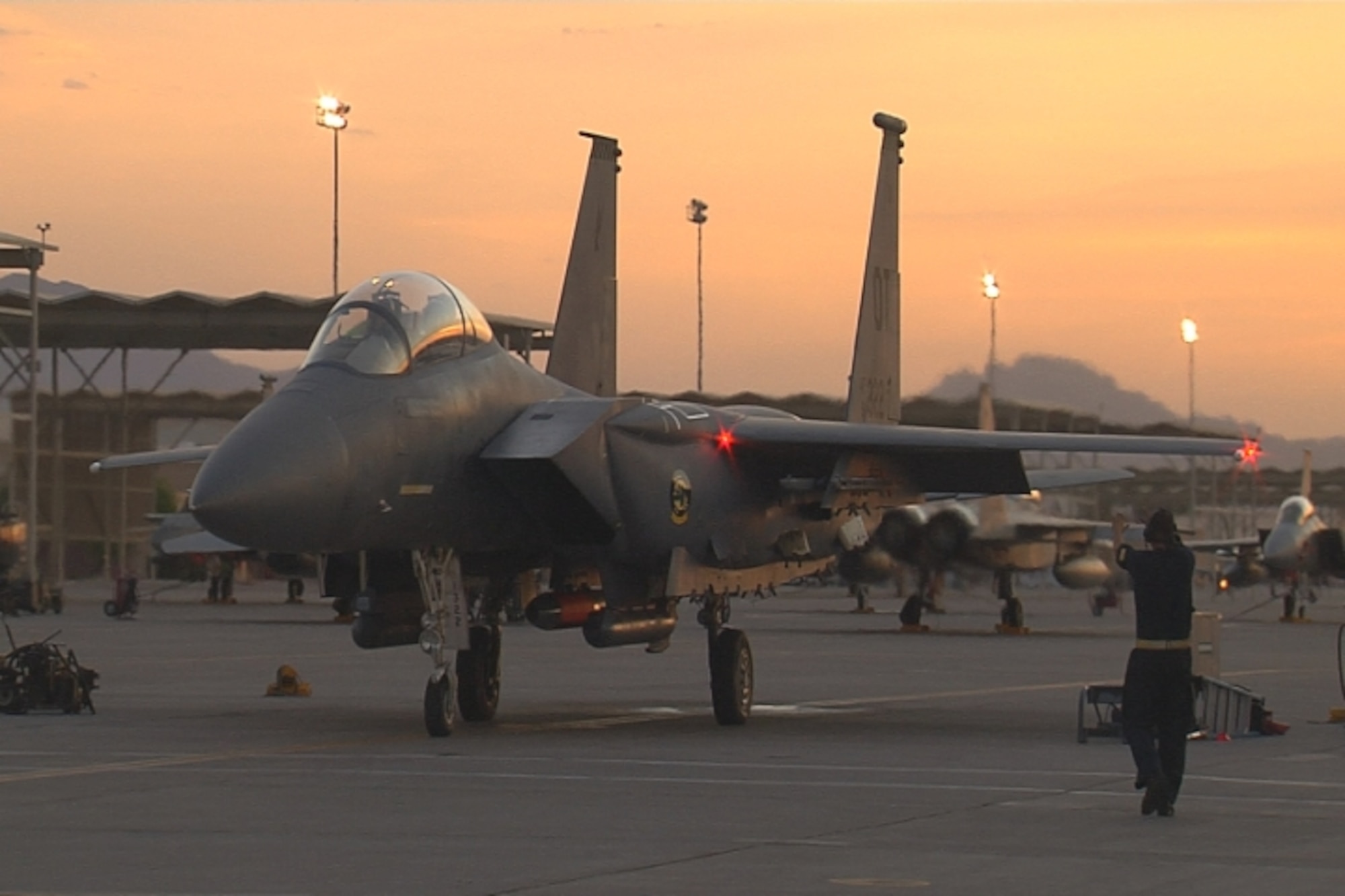 The F-15E OT322 taxis in preparation for takeoff. An inert version of the upgraded B61 nuclear weapon was released it from the aircraft over the Nellis Test and Training Range Complex. The B61 is in the process of a life-extension program, which includes upgrading aging components and a new tail kit assembly.  (Courtesy photo)