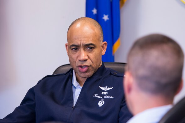 U.S. Air Force Brig. Gen. James Johnson, left, Air Force Recruiting Service commander, speaks to Capt. Brian Murray, 336th Recruiting Squadron operations flight commander, July 7, 2015, at Moody Air Force Base, Ga. During his visit, Johnson said one of his top priorities is ensuring every recruiter has a dedicated government-owned vehicle. (U.S. Air Force photo by Airman 1st Class Ceaira Tinsley/Released)