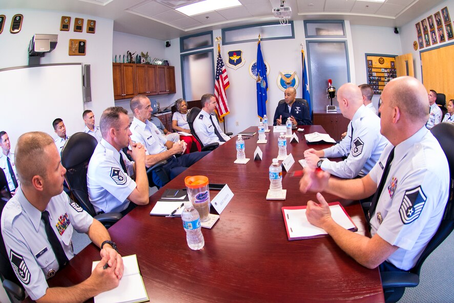 U.S. Air Force Brig. Gen. James Johnson, Air Force Recruiting Service commander, conducts an office-call with Airmen from the 336th Recruiting Squadron July 7, 2015, at Moody Air Force Base, Ga. Johnson addressed changes to the evaluation performance report system, promotion rates amongst recruiters and the importance of mentorship to accomplish the mission. (U.S. Air Force photo by Airman 1st Class Ceaira Tinsley/Released)