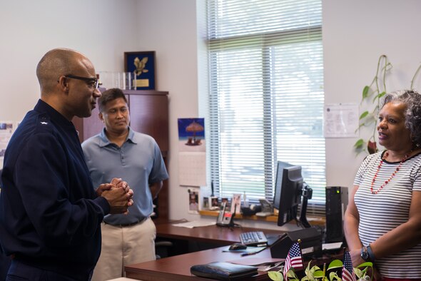 U.S. Air Force Brig. Gen. James Johnson, left, Air Force Recruiting Service commander, addresses the concerns of Leila Brown, 336th Recruiting Squadron recruiter support manager, during his visit, July 7, 2015, at Moody Air Force Base, Ga. While at Moody, Johnson offered solutions to the challenges the 336th RCS Airmen face and gave insight to the future of the career field. (U.S. Air Force photo by Airman 1st Class Ceaira Tinsley/Released)