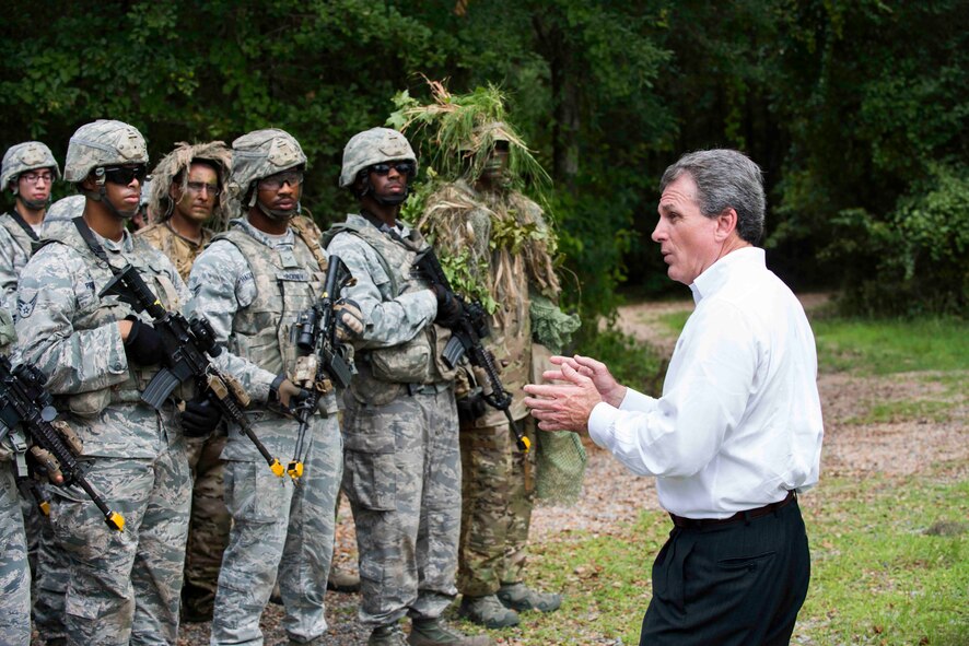 U.S. Rep. Buddy Carter of Georgia, poses for a group photo with Airmen from the 820th Base Defense Group after a military operations in urban terrain demonstration July 2, 2015, at Moody Air Force Base, Ga. Carter visited Moody to view its mission capabilities and voice them to Congress. (U.S. Air Force photo by Airman 1st Class Dillian Bamman/Released)