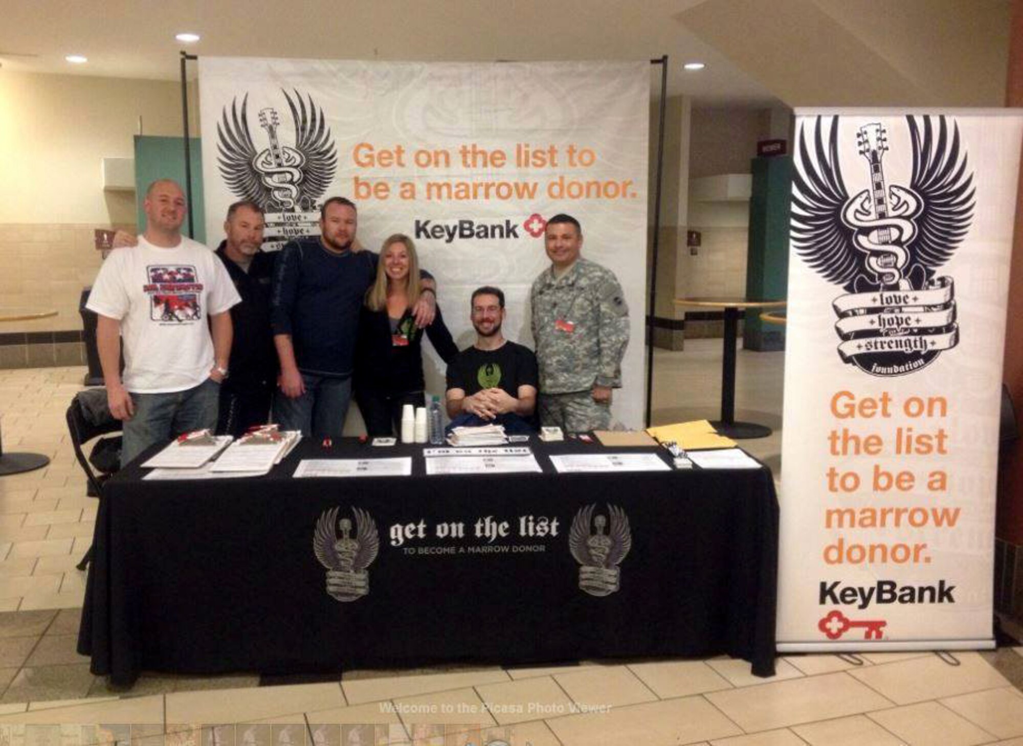 Army Master Sgt. Frankie Gomez (far right), a Colorado National Guardsman, represents Salute to Life, the Department of Defense’s bone marrow registry program, at a joint civilian-military bone marrow donor drive during Hope Strength at the Colorado Avalanche game Nov. 8, 2013 in Denver. (Photo provided by Love, Hope, Strength/Used With Permission)