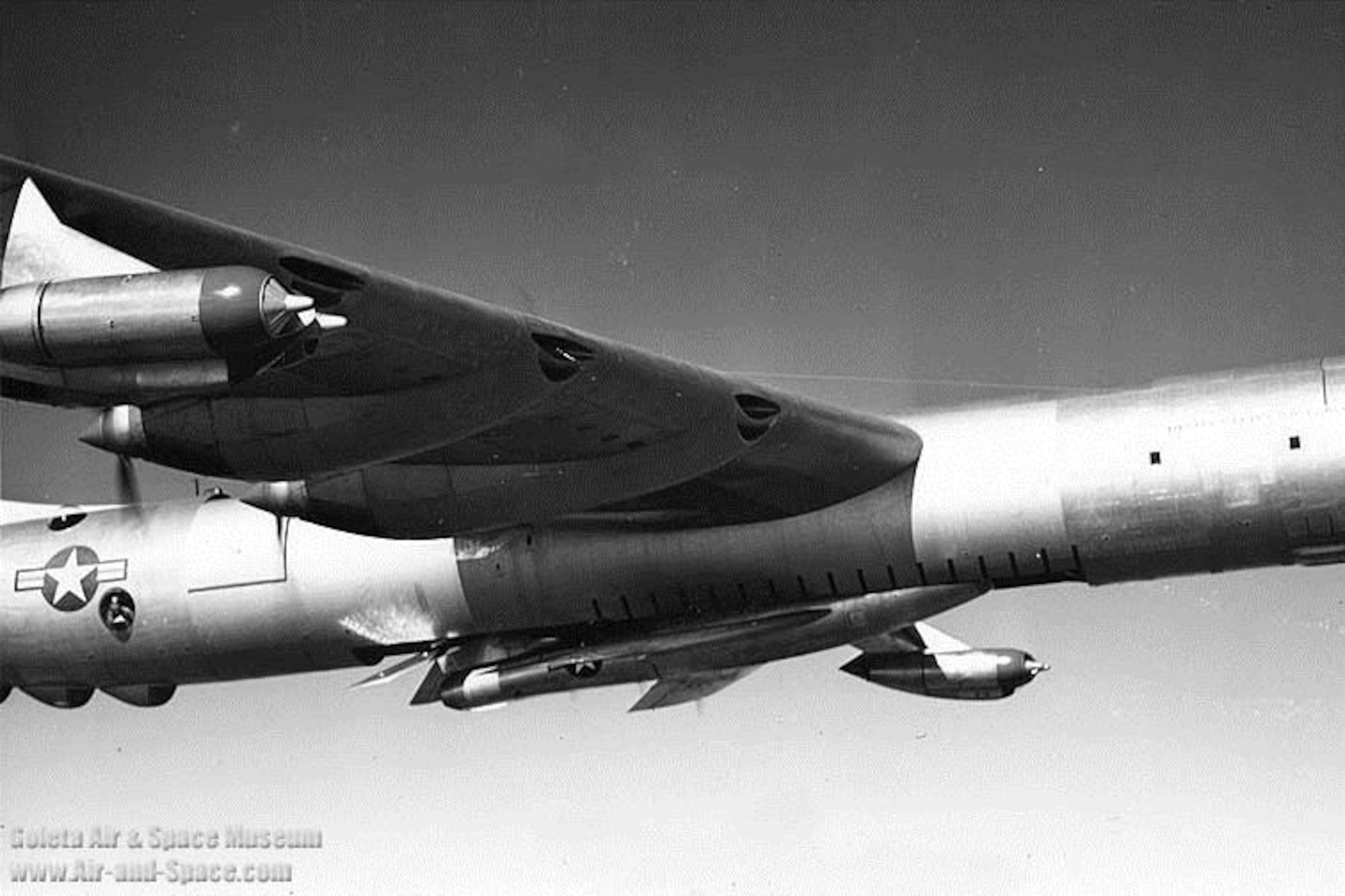 The parasite fighter nestled in the belly of the GRB-36 Peacemaker. (U.S. Air Force photo)