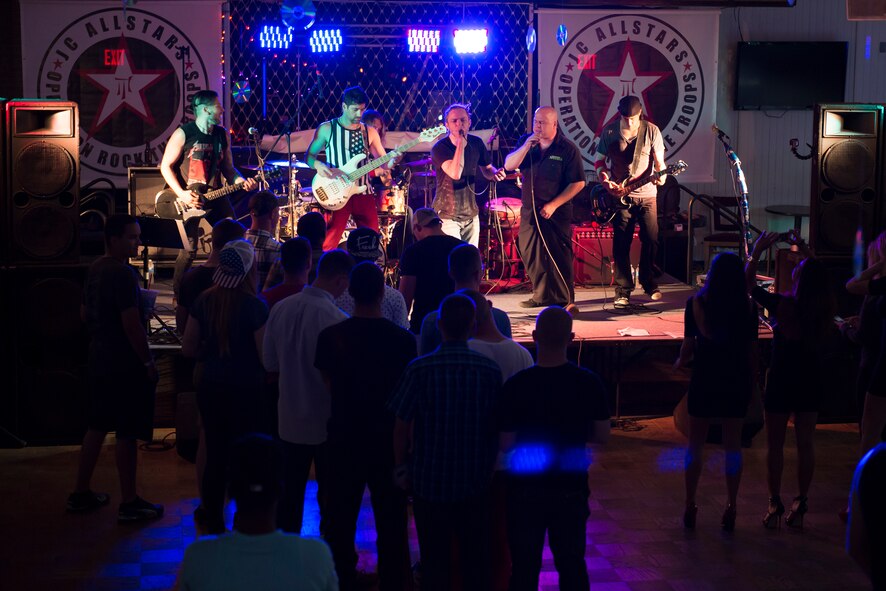 The JC AllStars perform for U.S. Air Force Airmen at Sheppard Air Force Base, Texas, July 3, 2015. Matthew JC – a four-time Emmy Award winner – who wishes to give back to the troops through live entertainment and music education leads the band. They also sponsor a grant for troops who wish to pursue music. This image is not official endorsement by the U.S. Air Force. (U.S. Air Force photo by Senior Airman Kyle Gese/Released)