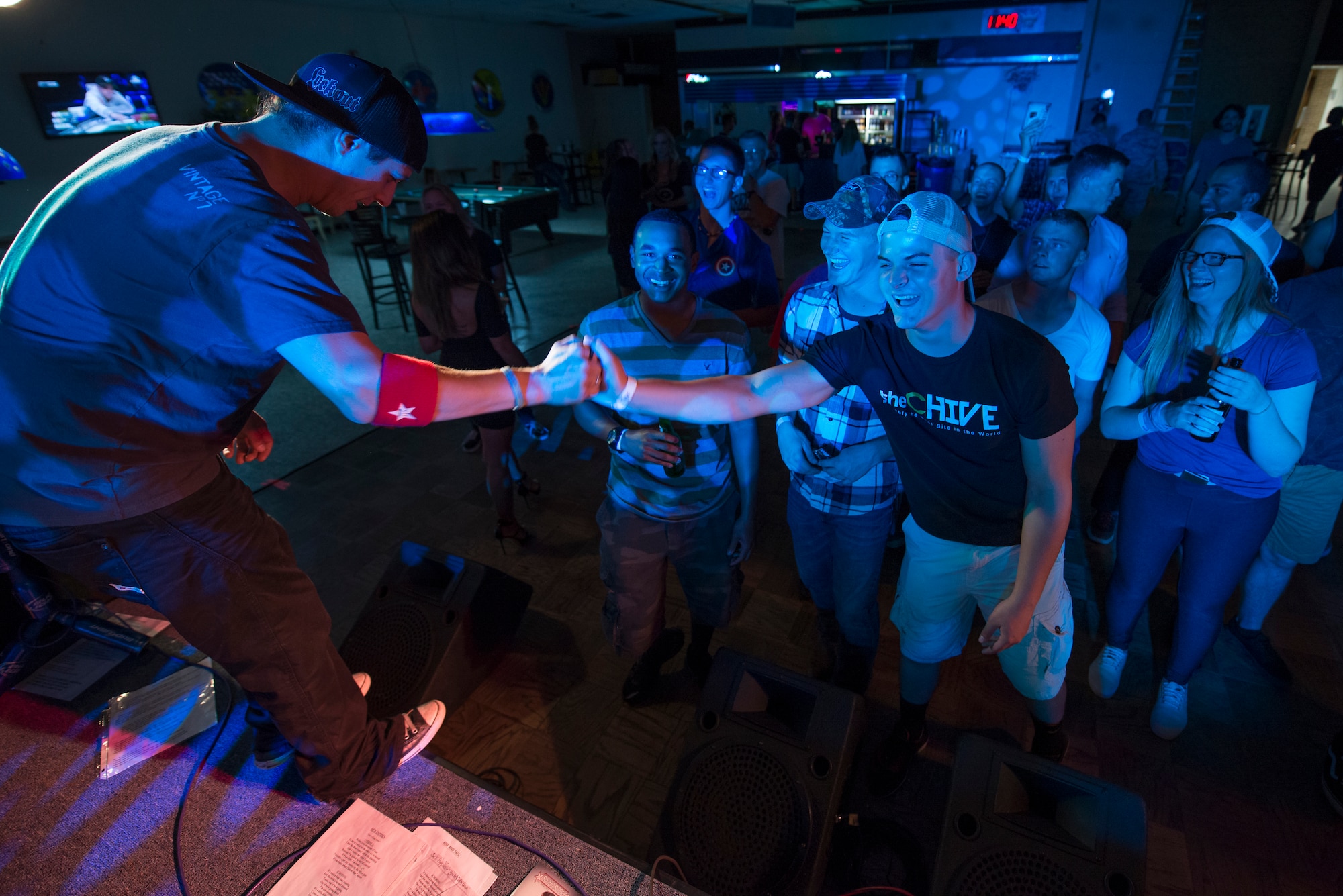 Matthew JC shakes hands with Airmen who attended the JC AllStars performance at Sheppard Air Force Base, Texas, July 3, 2015. The JC AllStars are a non-profit band with a mission to give back to the troops through live entertainment and music education. They also sponsor a grant for troops who wish to pursue music. This image is not official endorsement by the U.S. Air Force. (U.S. Air Force photo by Senior Airman Kyle Gese/Released)