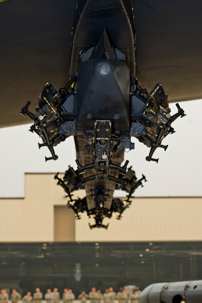 An empty B-52H Stratofortress bomb rack is about to be loaded by Airmen from the 5th Aircraft Maintenance Squadron as part of the Load Crew of the Quarter competition at Minot Air Force Base, N.D., July 1, 2015.  The competition is comprised of four parts: dress and appearance, a loader’s knowledge test, toolbox inspection and the timed missile load.  (U.S. Air Force photo/ Airman 1st Class Justin T. Armstrong)