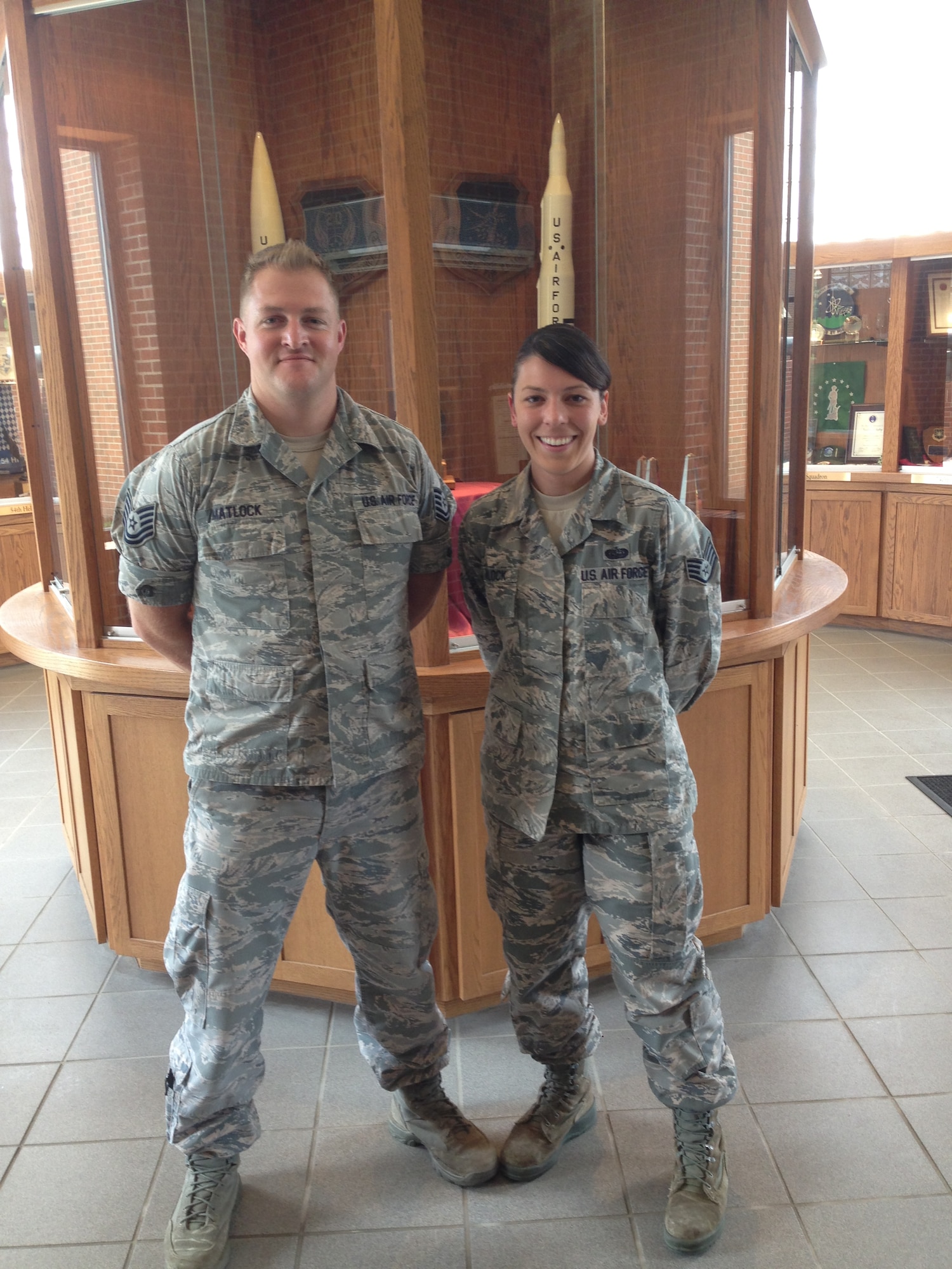 Tech Sgt. Matthew Matlock of the 741st Missile Squadron and Staff Sgt. Vanessa Matlock of the 740st Missile Squadron are quite the team, professionally and personally. Together they may break ground as the first pair of spouse Facility Managers supporting the ICBM mission at Minot AFB, ND. (U.S. Air Force photo)