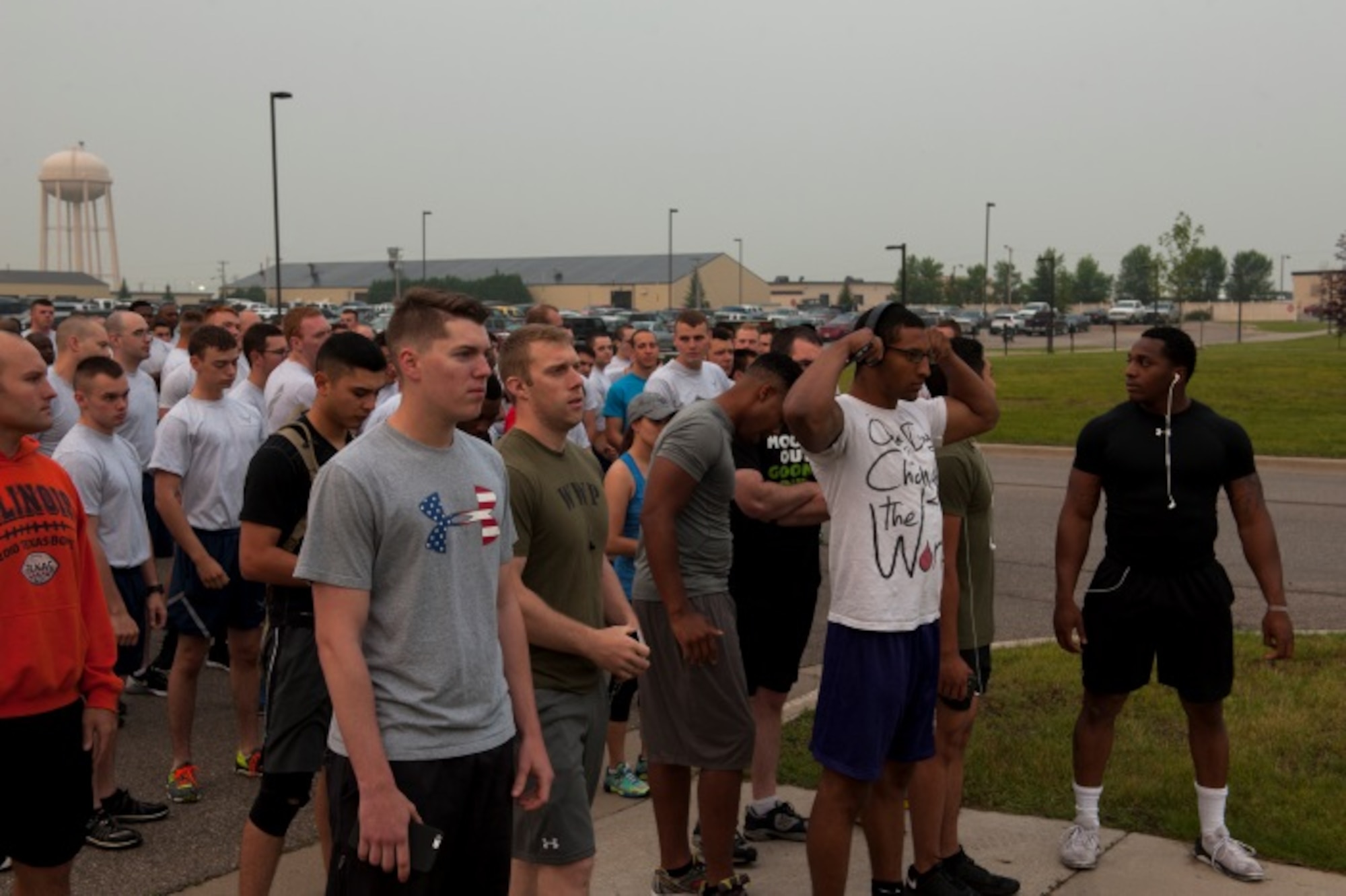 Airmen prepare to start the Firecracker 5K at Minot Air Force Base, N.D., July 2, 2015. The fitness center tries to host about one to two runs or special events a month to keep military personnel and their families participating in the community. (U.S. Air Force photo/Airman 1st Class Christian Sullivan)