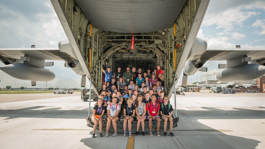 Students enrolled in the Minnesota Aviation Career Education Camp pose for a group photo during a static tour of a 934th Airlift Wing C-130 aircraft at the Minneapolis-St. Paul Air Reserve Station, Minn.  ACE Camp is a week-long, residential camp for high school students that allows them to explore many different careers in the aviation field, including piloting, air traffic control, engineering, and the military.  (U.S. Air Force photo by Shannon McKay/Released)