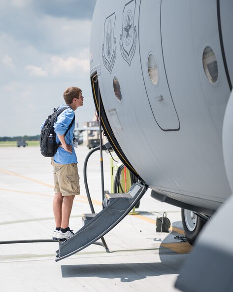Students enrolled in the Minnesota Aviation Career Education Camp take a static tour of a 934th Airlift Wing C-130 aircraft at the Minneapolis-St. Paul Air Reserve Station, Minn.  ACE Camp is a week-long, residential camp for high school students that allows them to explore many different careers in the aviation field, including piloting, air traffic control, engineering, and the military.  (U.S. Air Force photo by Shannon McKay/Released)