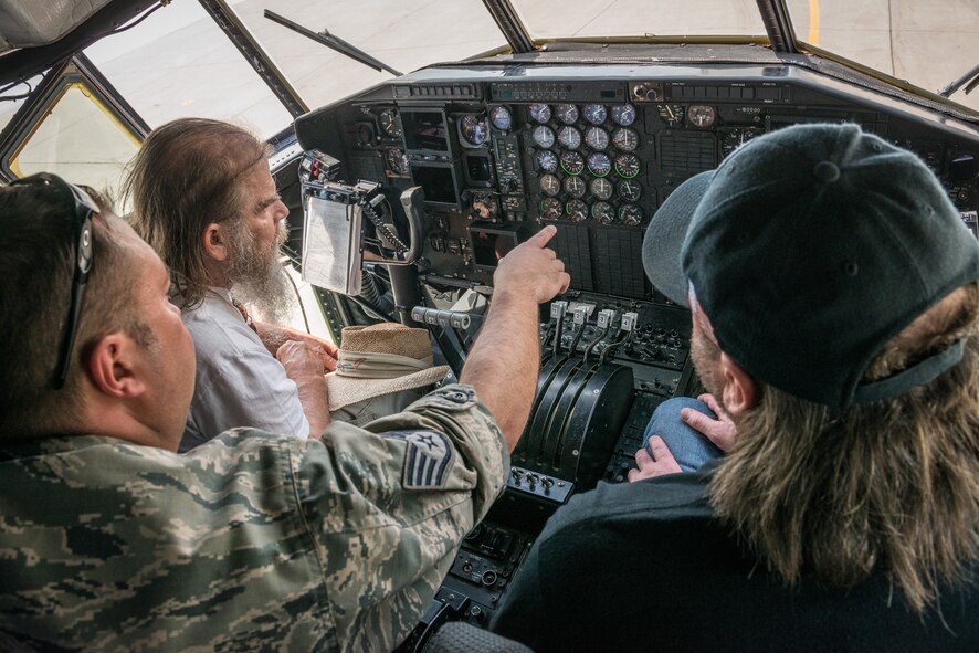 Staff Sgt. Michael Veile, 934th Maintenance Squadron, explains the instrument panel of a C-130 aircraft to residents of the Minnesota Veterans Homes in Minneapolis and Hastings.  The 934th Airlift Wing hosted  the annual Take a Vet to Lunch where veterans join members of the 934 Airlift Wing for an afternoon of lunch, conversation, and an aircraft tour at the Minneapolis-St. Paul Air Reserve Station, Minn.  (U.S. Air Force photo by Shannon McKay/Released)