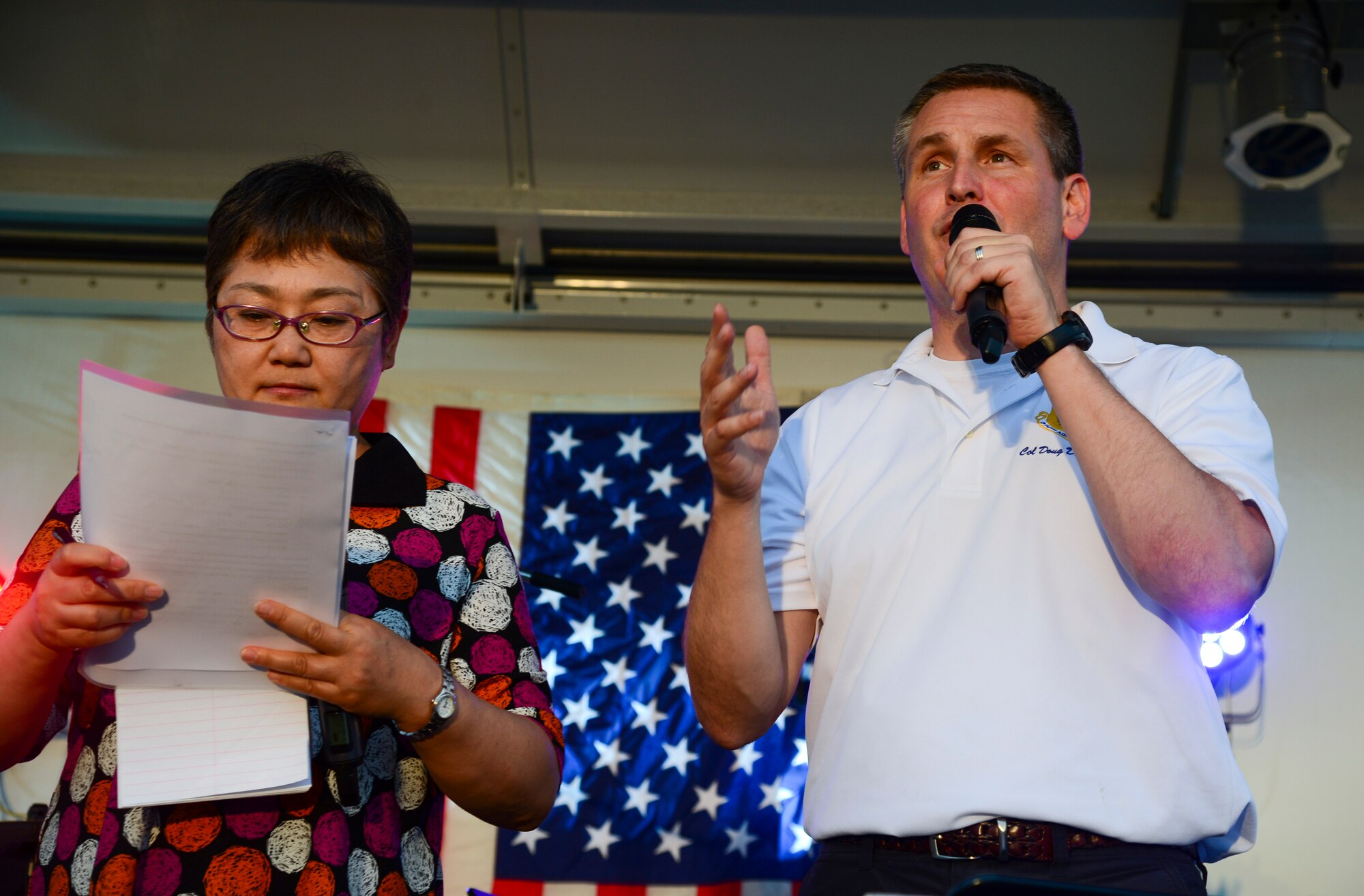 Col. Douglas DeLaMater, 374th Airlift Wing commander, gives a speech during the Celebrate America event at Yokota Air Base, Japan, July 2, 2015. Festivities of the day included a 5K run, live music performances, petting zoos, go-kart racing and fireworks in celebration of Independence Day. (U.S. Air Force photo by Senior Airman David Owsianka/Released)