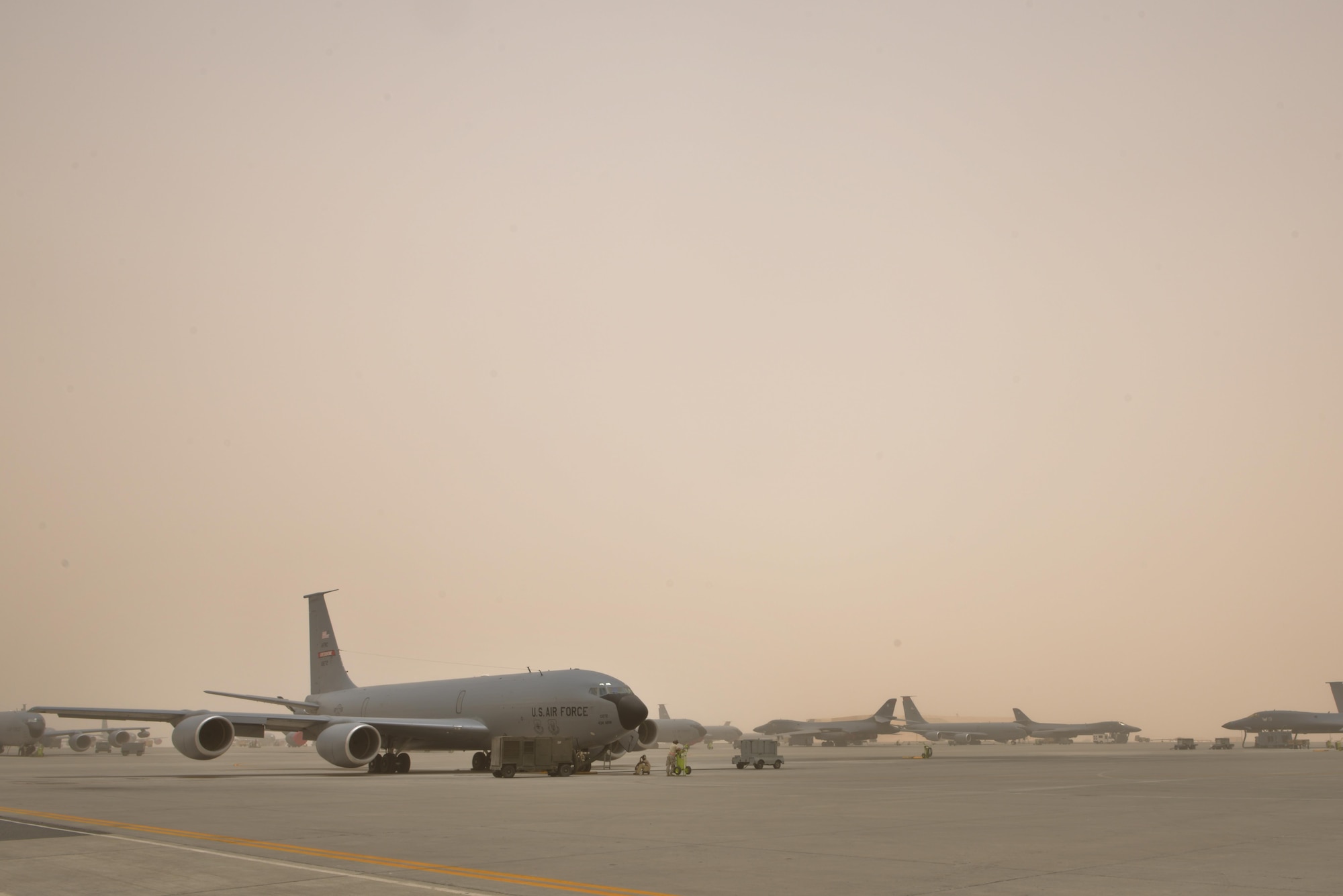 Airmen assigned to 340th Expeditionary Aircraft Maintenance Unit completed post and pre-flight inspections during a wind storm that reached over 50 knots June 7, 2015 Al Udeid Air Base, Qatar. 