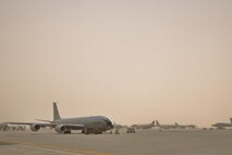 Airmen assigned to 340th Expeditionary Aircraft Maintenance Unit completed post and pre-flight inspections during a wind storm that reached over 50 knots June 7, 2015 Al Udeid Air Base, Qatar. 