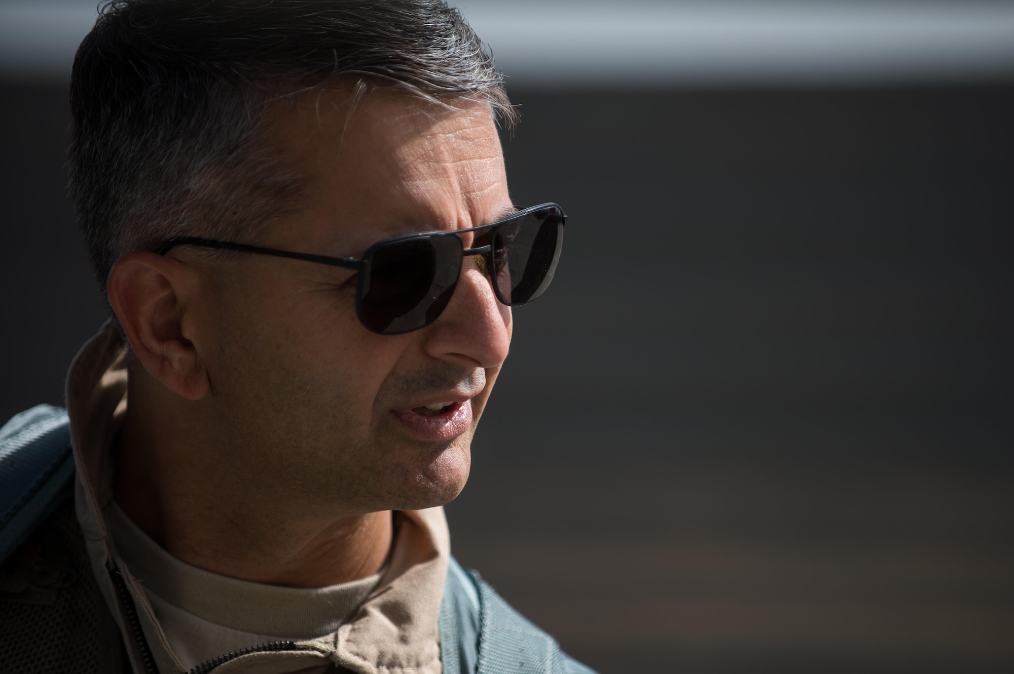 U.S. Air Force Brig. Gen. Dave Julazadeh, 455th Air Expeditionary Wing commander, talks with an F-16 Fighting Falcon aircraft crew chief before flying a combat sortie July 7, 2015, at Bagram Airfield, Afghanistan. Julazadeh was flying his first combat sortie as commander of the 455th AEW. (U.S. Air Force photo by Tech. Sgt. Joseph Swafford/Released)