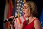 Katryna Marttala, 16-year-old daughter of retired Air Force Col. David Marttala, performs the National Anthem for the Boys and Girls Club Southwest Region Military Youth of the Year Awards event June 24 at the Grand Hyatt Hotel in San Antonio.(Courtesy photo/Darren Abate)
