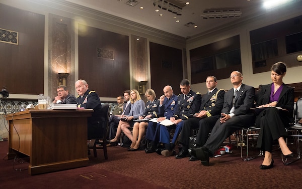 18th Chairman of the Joint Chiefs of Staff Gen. Martin E. Dempsey joins Secretary of Defense Ashton B. Carter for testimony before the U.S. Senate Committee on Armed Services' hearing discussing Counter-ISIL(Islamic State of Iraq and the Levant) Strategy, on Capitol Hill, July 7, 2015.