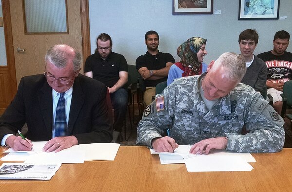 Col. Christopher Barron, New England District Commander, entered into an education partnership agreement with MassBay Community College, May 26, 2015. Col. Barron and John O’Donnell, President of MassBay Community College signed the agreement at the Wellesley, Massachusetts Campus