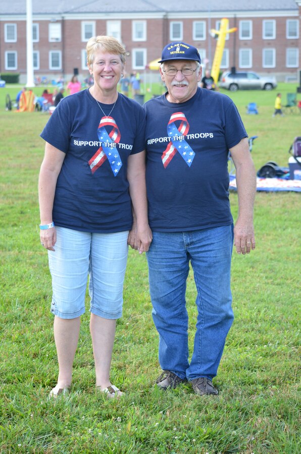 Robert and Lisa Morse stroll around Lejeune Field, hand in hand, during Marine Corps Base Quantico’s July 4th celebration.