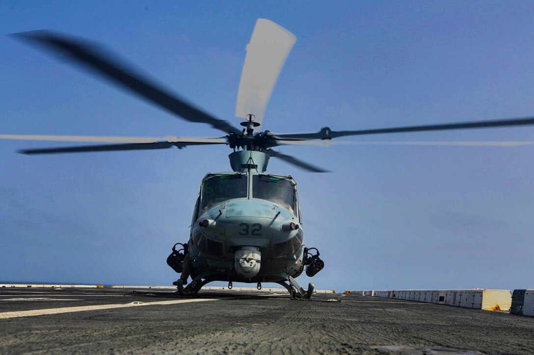 ARABIAN SEA (July 6, 2015) A UH-1Y Venom from the “Greyhawks” of Marine Medium Tiltrotor Squadron 161 (Reinforced), 15th Marine Expeditionary Unit, prepares for take-off during flight quarters aboard the amphibious transport dock USS Anchorage (LPD 23) The “Greyhawks” are the air combat element of the 15th MEU, and embarked aboard the ships of the Essex Amphibious Ready Group, are deployed in support of maritime security operations and theater security cooperation efforts in the U.S. 5th Fleet area of operations. (U.S. Marine Corps photo by Sgt. Jamean Berry/ Released)