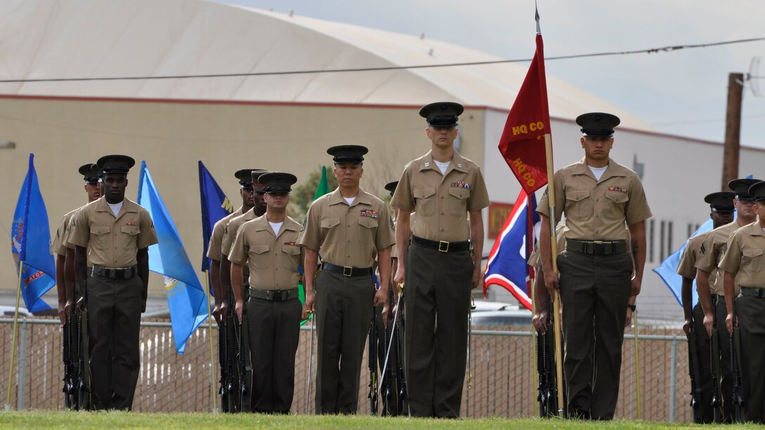 Capt. W. Adam Hemme, company commander of Fleet Services Division, leads Marines during change of command ceremony aboard Marine Corps Logistics Base Barstow, Calif., July 1.  Col. Sekou S. Karega assumed command of the base from Col. Michael L. Scalise, making him the 32nd commander for the base since it opened in 1943.  
