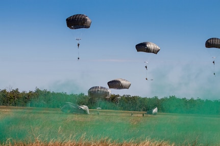 ROCKHAMPTON, Australia (July 8, 2015) - Service members, from 4th Brigade Combat Team, 25th Infantry Division, parachute onto the Kapyong Air Field, Australia, in support of Exercise Talisman Sabre 15. 