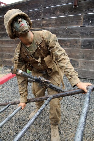 Recruit Simon C. Bell, Platoon 1031, Bravo Company, 1st Recruit Training Battalion, takes the lead in a Crucible exercise designed to promote teamwork at Marine Corps Base Camp Pendleton, July 1. Bell is a Houston, native and was recruited out of Recruiting Station Houston. Today, all male recruits from recruiting stations west of the Mississippi are trained at MCRD San Diego. The depot is responsible for training more than 16,000 recruits annually. Bravo Company is scheduled to graduate July 10.