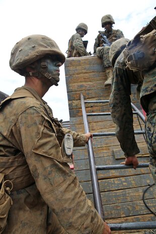 Recruit Simon C. Bell, Platoon 1031, Bravo Company, 1st Recruit Training Battalion, takes the lead in a Crucible exercise designed to promote teamwork at Marine Corps Base Camp Pendleton, July 1. Bell is a Houston, native and was recruited out of Recruiting Station Houston. Today, all male recruits from recruiting stations west of the Mississippi are trained at MCRD San Diego. The depot is responsible for training more than 16,000 recruits annually. Bravo Company is scheduled to graduate July 10.