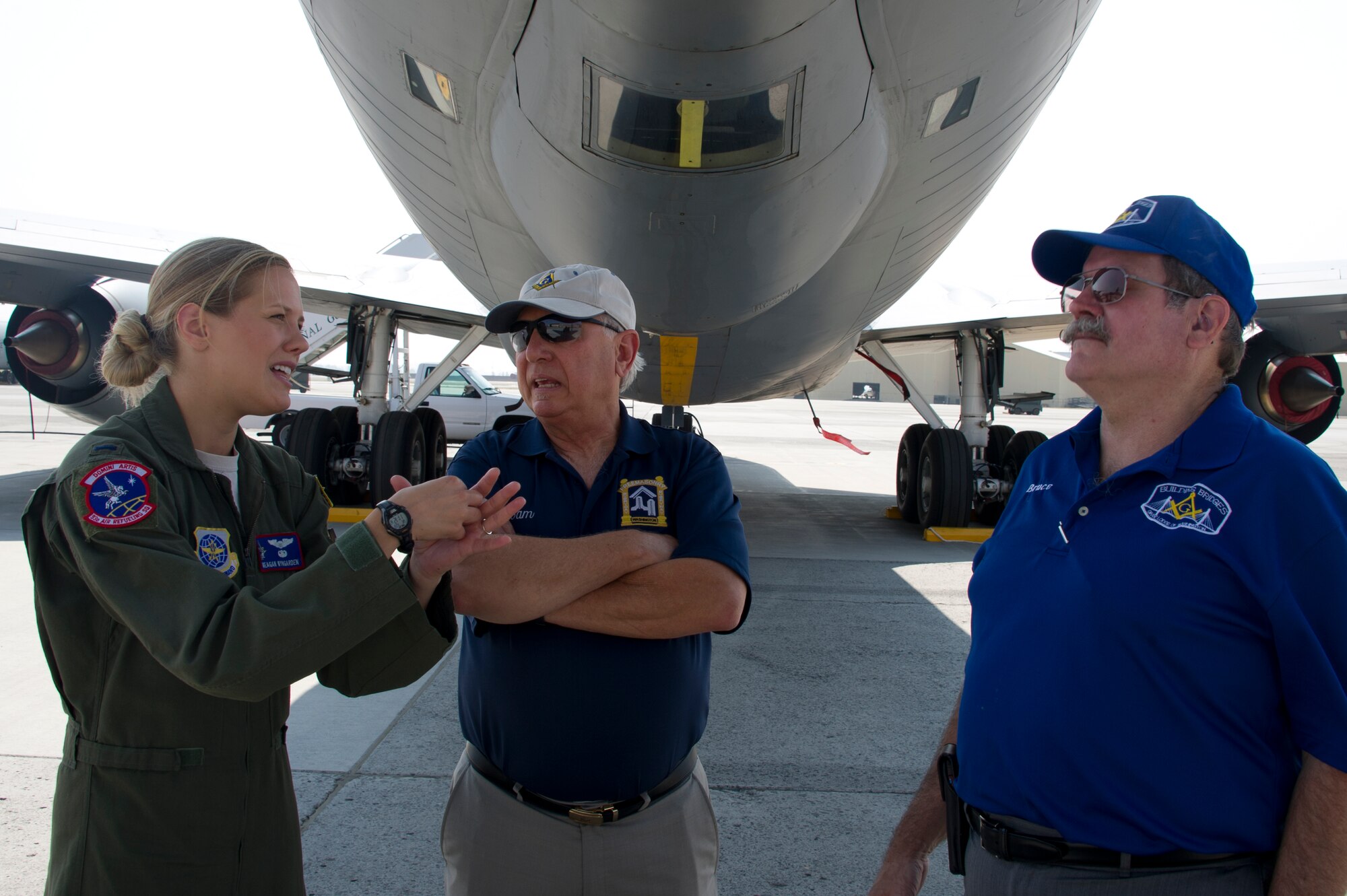 Lt. Meagan Wyngarden, 93rd Air Refueling Squadron KC-135 Stratotanker pilot, explains to members of the Masonic Lodges of Washington how the KC-135 ‘boom’ operates, July 8, 2015, at Fairchild Air Force Base, Wash. The Masonic Lodges of Washington viewed the static KC-135 display and learned the mission capabilities of the aircraft from crew members. (U.S. Air Force photo/Airman 1st Class Nicolo J. Daniello)