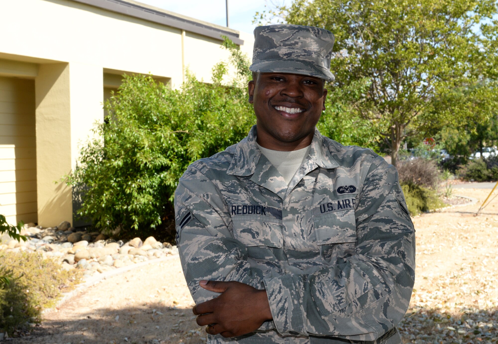 Airman 1st Class Willis Reddick, 9th Reconnaissance Wing Staff Judge Advocate civil law paralegal, poses for a photo July 7, 2015, at Beale Air Force Base, California. (U.S. Air Force photo by Airman 1st Class Ramon A. Adelan)