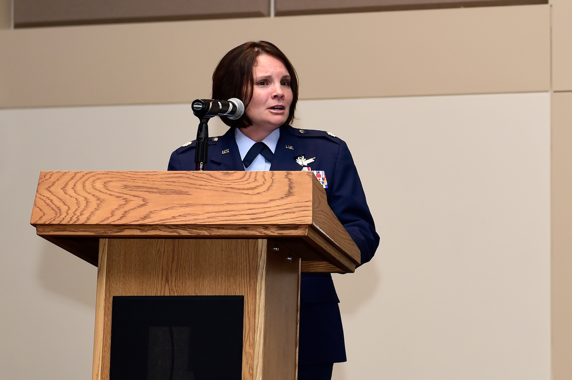 Lt. Col. April Wimmer, 2nd Space Warning Squadron commander, addresses her squadron during the change of command ceremony July 7, 2015, on Buckley Air Force Base, Colo. Wimmer became the commander of the 2nd SWS after serving as the operations officer at the 533rd Training Squadron, Vandenberg AFB, Cali. (U.S. Air Force photo by Staff Sgt. Stephany Richards/Released)