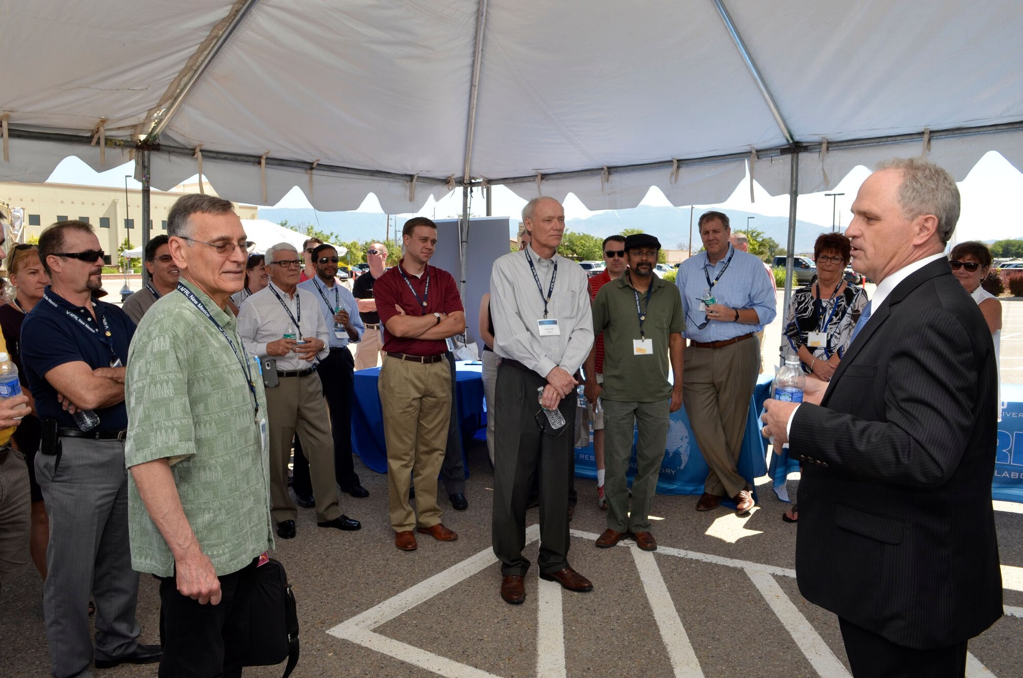 Air Force Research Laboratory Space Vehicles Directorate chief scientist Greg Spangers welcomes local dignitaries and community leaders to the AFRL New Mexico open house.
(Photo by Michelle Gigante) 
