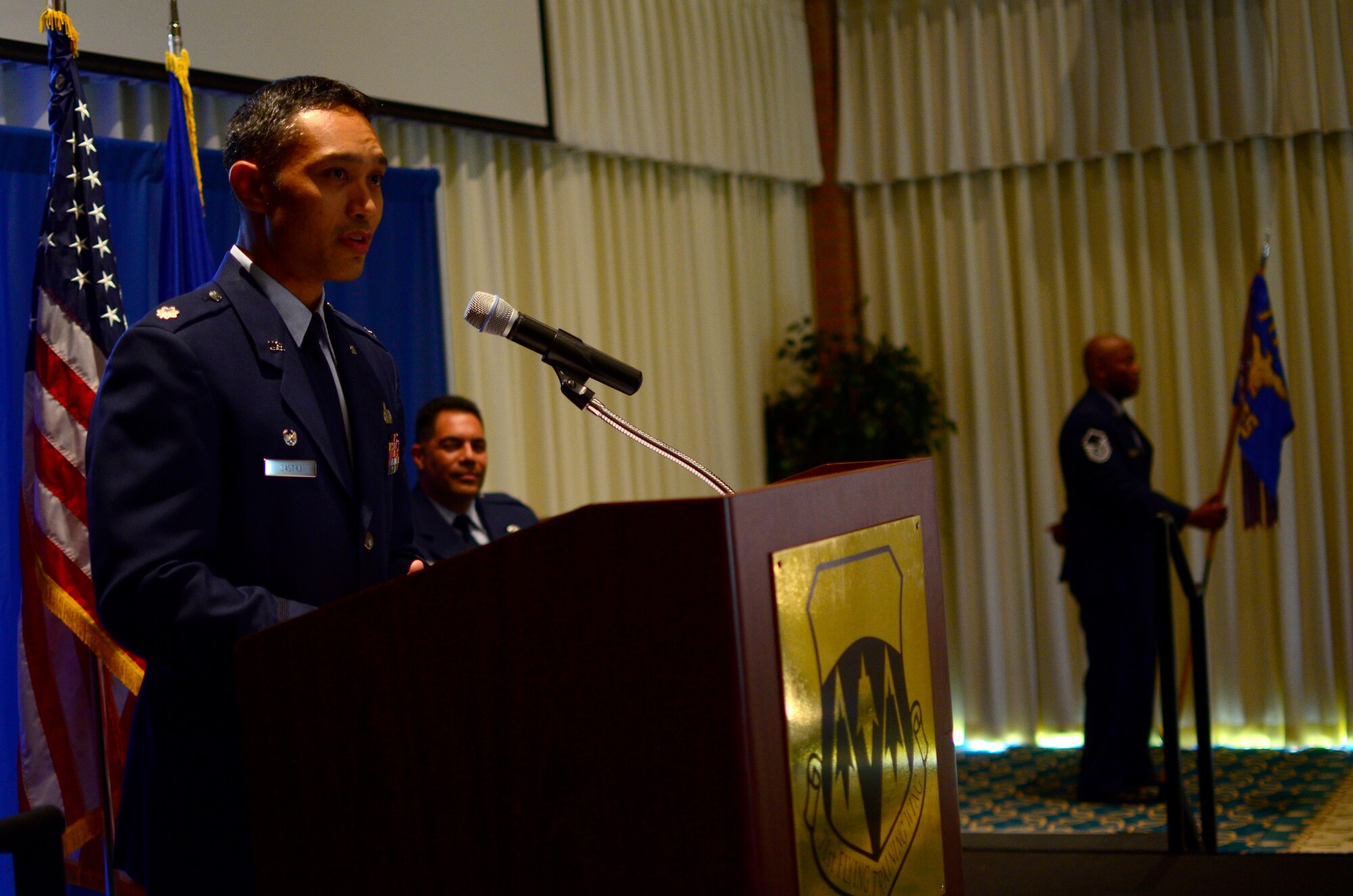 Lt. Col. Erick Castro speaks to his new troops after assuming command of the 71st Force Support Squadron in a ceremony July 6 at the Vance Collocated Club. Castro was most recently the lead arms control and military planner in the Office of Strategic Stability and Deterrence, Bureau of Arms Control Verification, U.S. Department of State. (U.S. Air Force photo / 2nd Lt. Mikhail Berlin)
