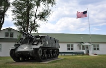A World War II-era howitzer is displayed in front of the Rocky Mountain Museum of Military History at Fort Missoula, Mont., July 7, 2015. The museum promotes the commemoration and study of the U.S. armed services, from the Frontier Period to the War on Terrorism. Displays include uniforms, weapons, photographs and scale models. (U.S. Air Force photo/John Turner)