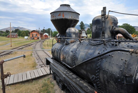 Visitors can imagine they are the engineer of a steam locomotive pulling up to the Drummond Depot and Grant Creek school house. Missoula County’s Historical Museum owns 32 acres at Fort Missoula, Mont., and displays historic buildings from the region. (U.S. Air Force photo/John Turner)