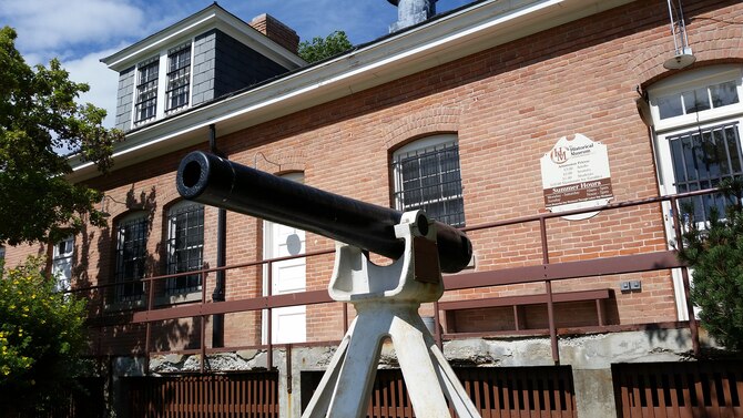 A salute gun stands outside the Historical Museum at Fort Missoula, Mont., July 7, 2015. The breech-loading gun was used from 1883-1942 for reveille and retreat ceremonies. The Historical Museum’s main building was built for the Army in 1911 as a quartermaster’s warehouse and currently has displays telling the history of the fort and Missoula County. (U.S. Air Force photo/John Turner)