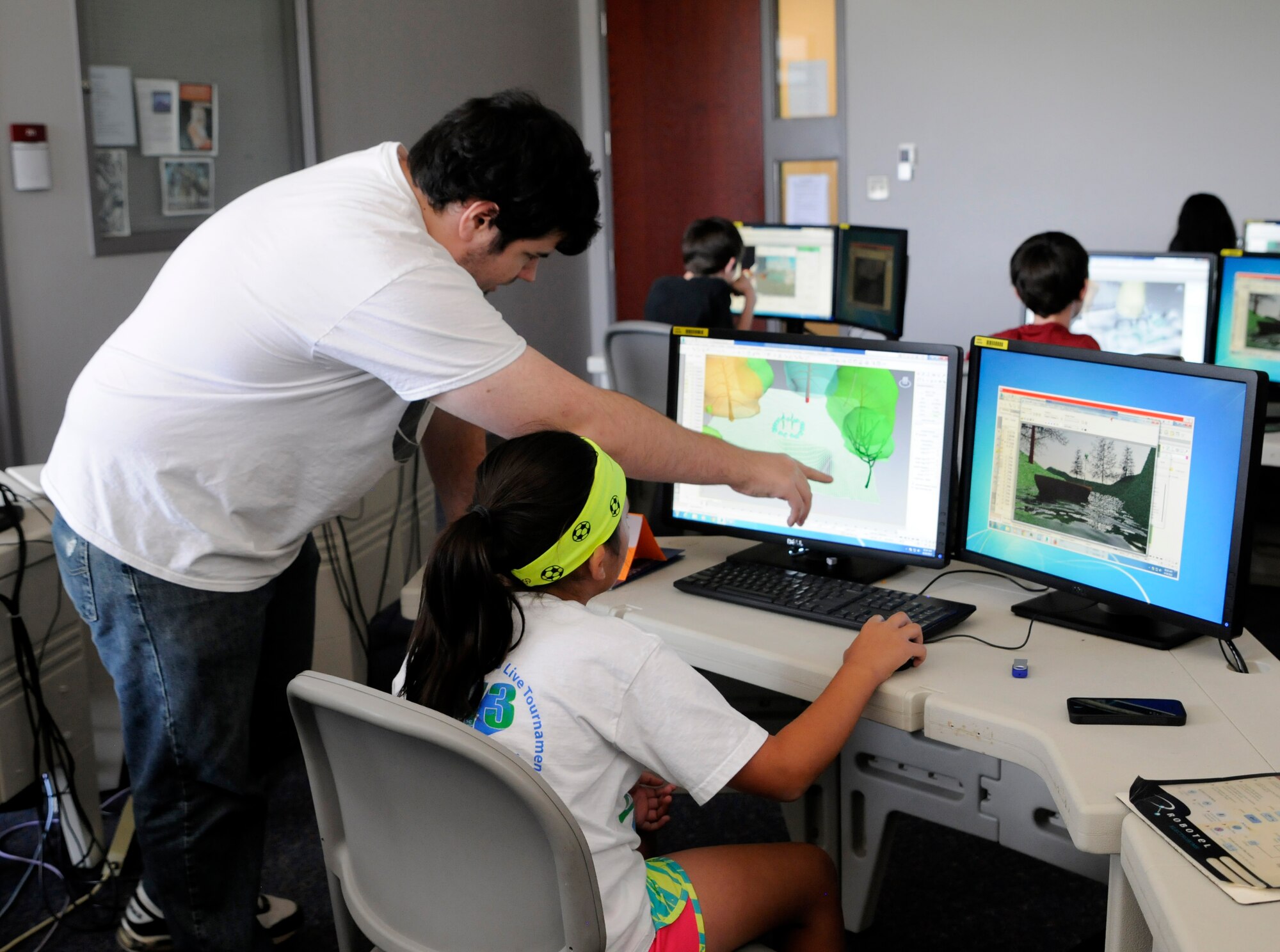 Kids from the 188th Wing participate in 3D Animation Camp at the University of Arkansas-Fort Smith on June 24, 2015. The 3D Animation Camp was a two and a half day camp that offered military children the opportunity to learn what it takes to design games, movie clips and commercials. Tuition for the class was provided through the Child and Youth Program at the National Guard Bureau, Washington D.C. The Child and Youth Program supports the social, emotional and academic needs of military children by lifting them up with knowledge and positive encouragement. (U.S. Air National Guard photo by Staff Sgt. Hannah Dickerson/Released)